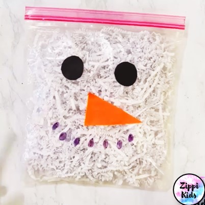 shredded paper snowman in a bag winter craft